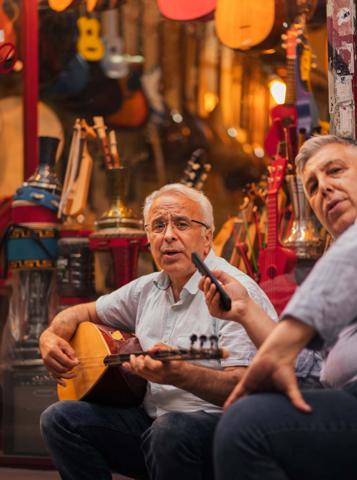Istanbul Friendship — An intimate moment between two friends in the streets of Istanbul. Singing, playing guitar, and most importantly — making unforgettable memories. I've made those same memories myself with my friend in the old days.